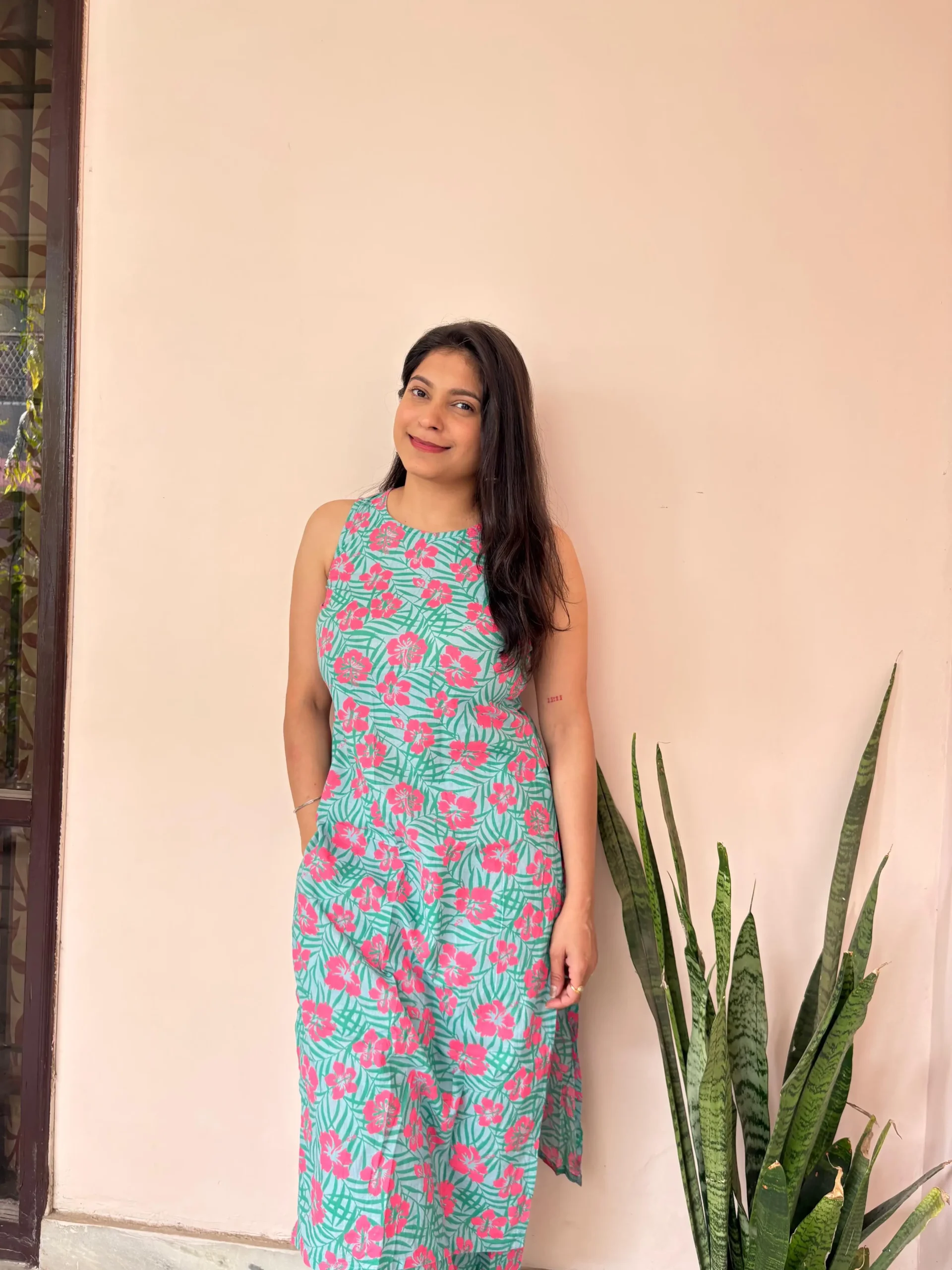 aqua floral print sleeveless kurta set side view with pockets